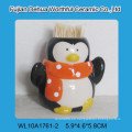 Adorable pingüino de Navidad titular de cerámica Toothpick